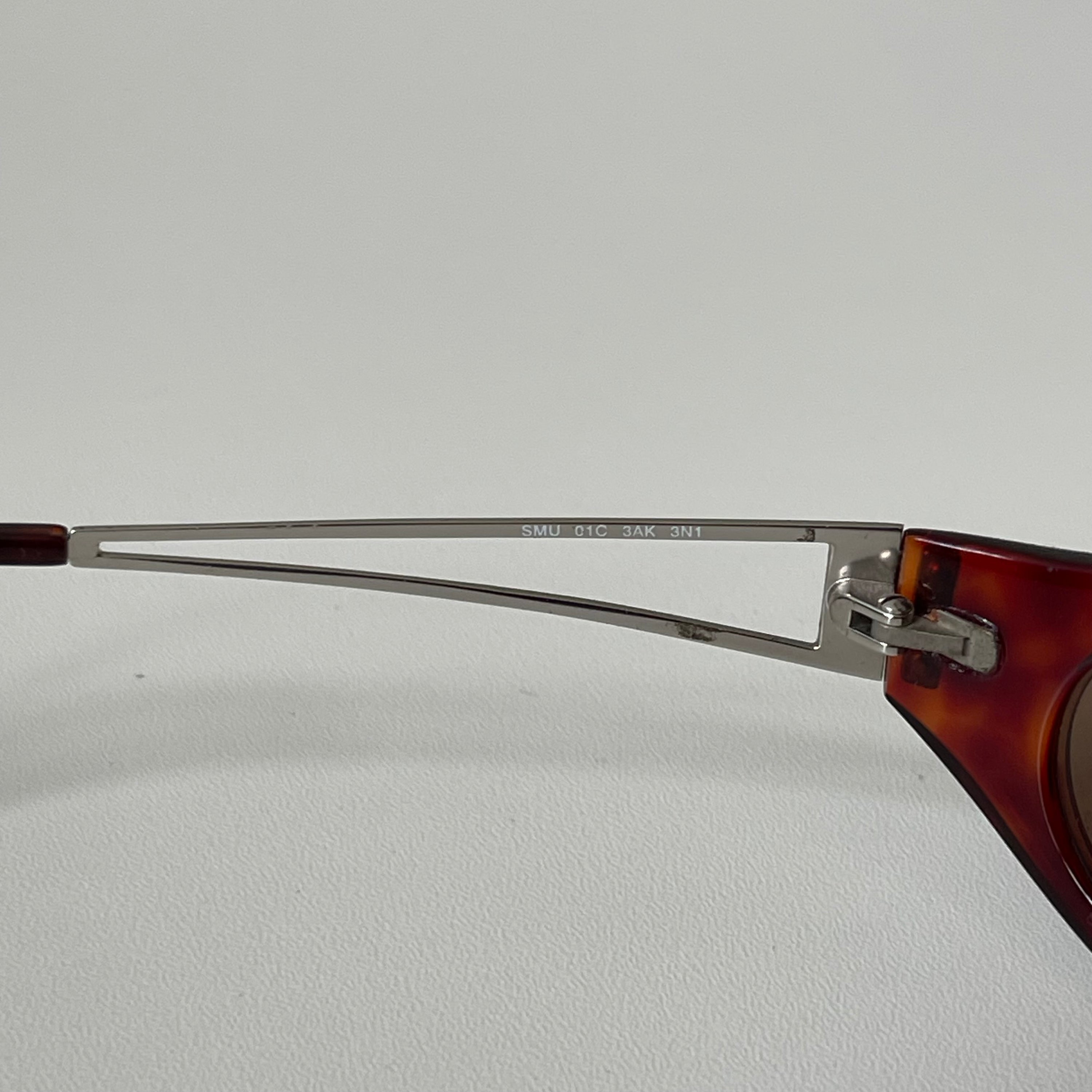 Miu miu SMU 01C Brown Sunglasses