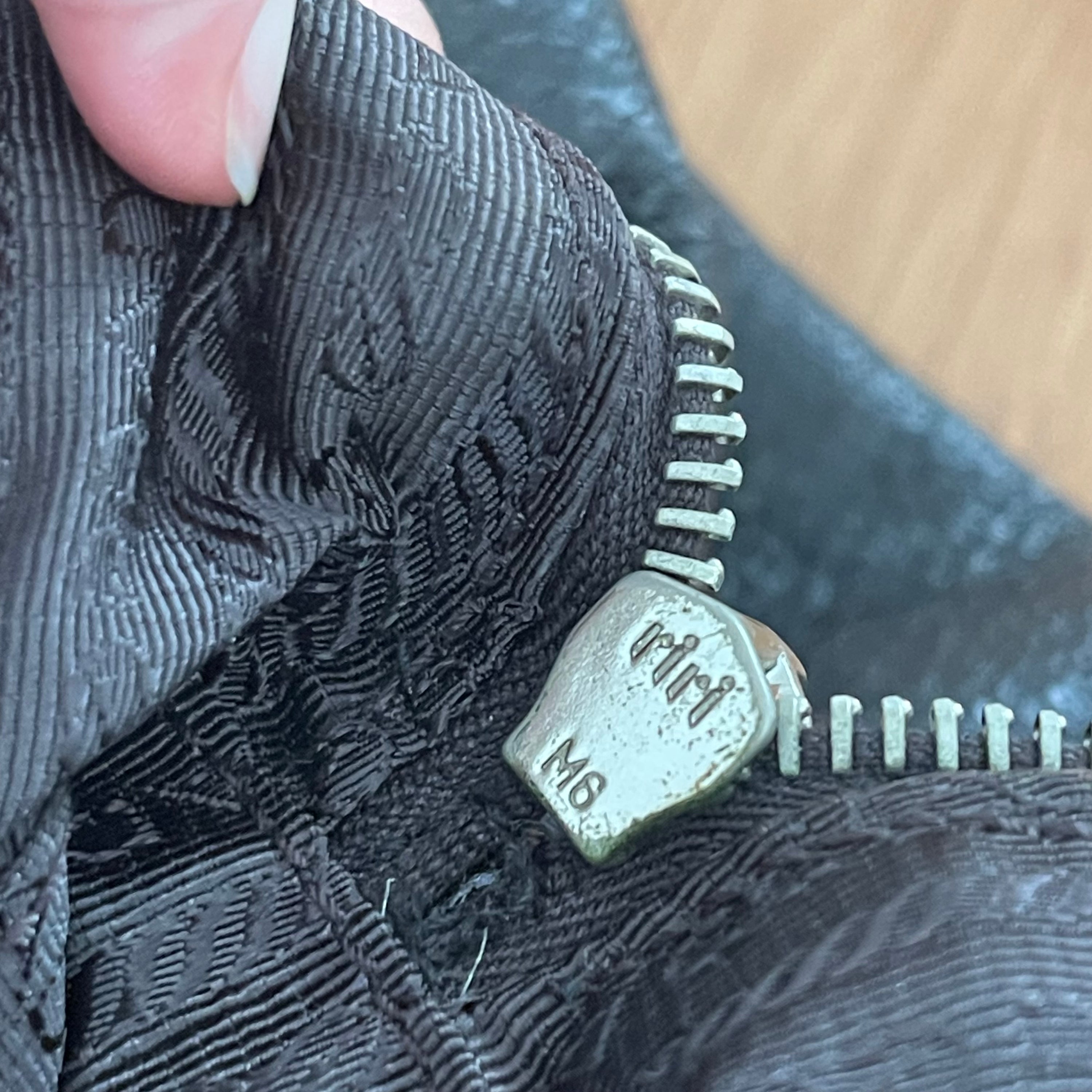 Prada Shimmering Leather Top Handle Bag