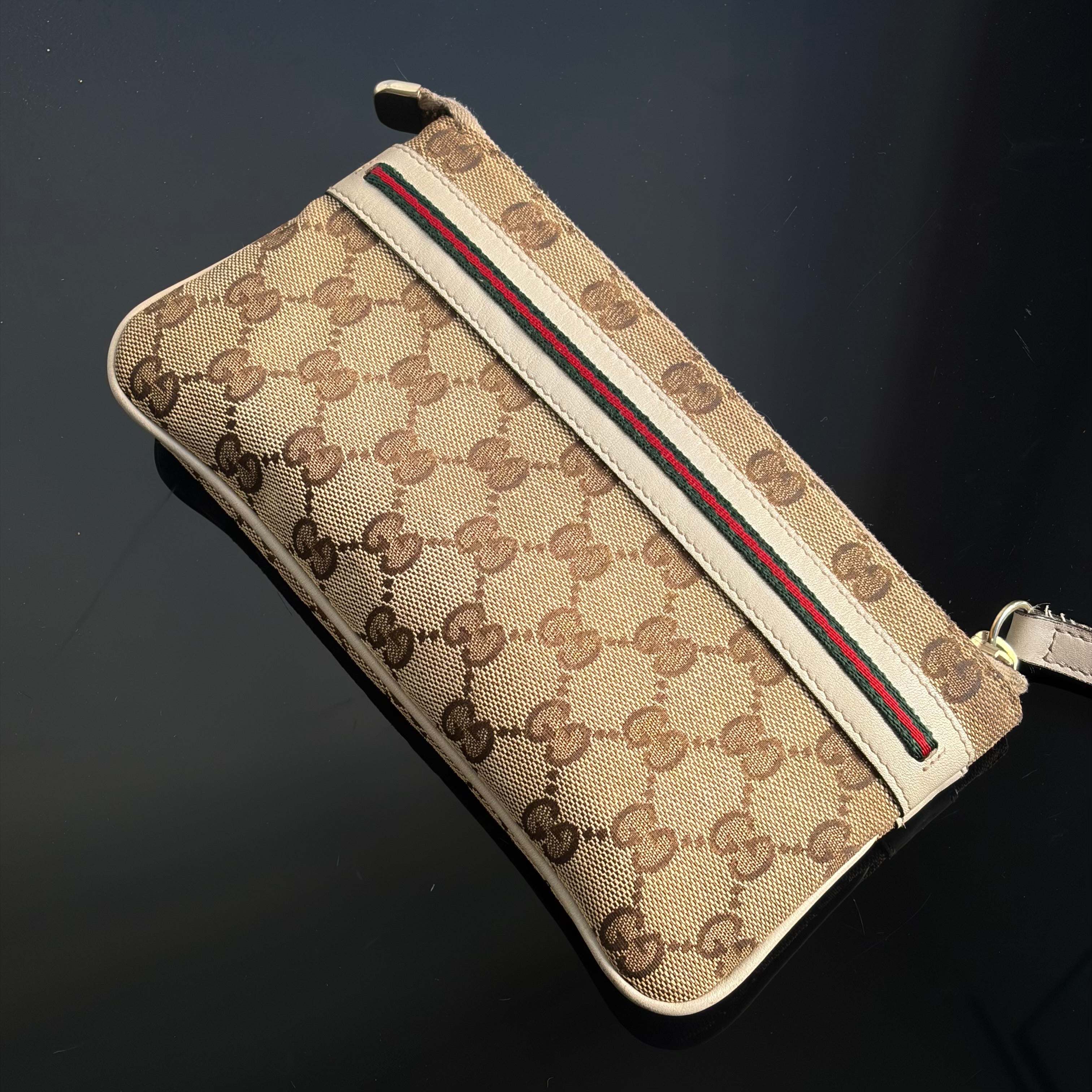 Gucci Monogram Mayfair Wristlet Bag