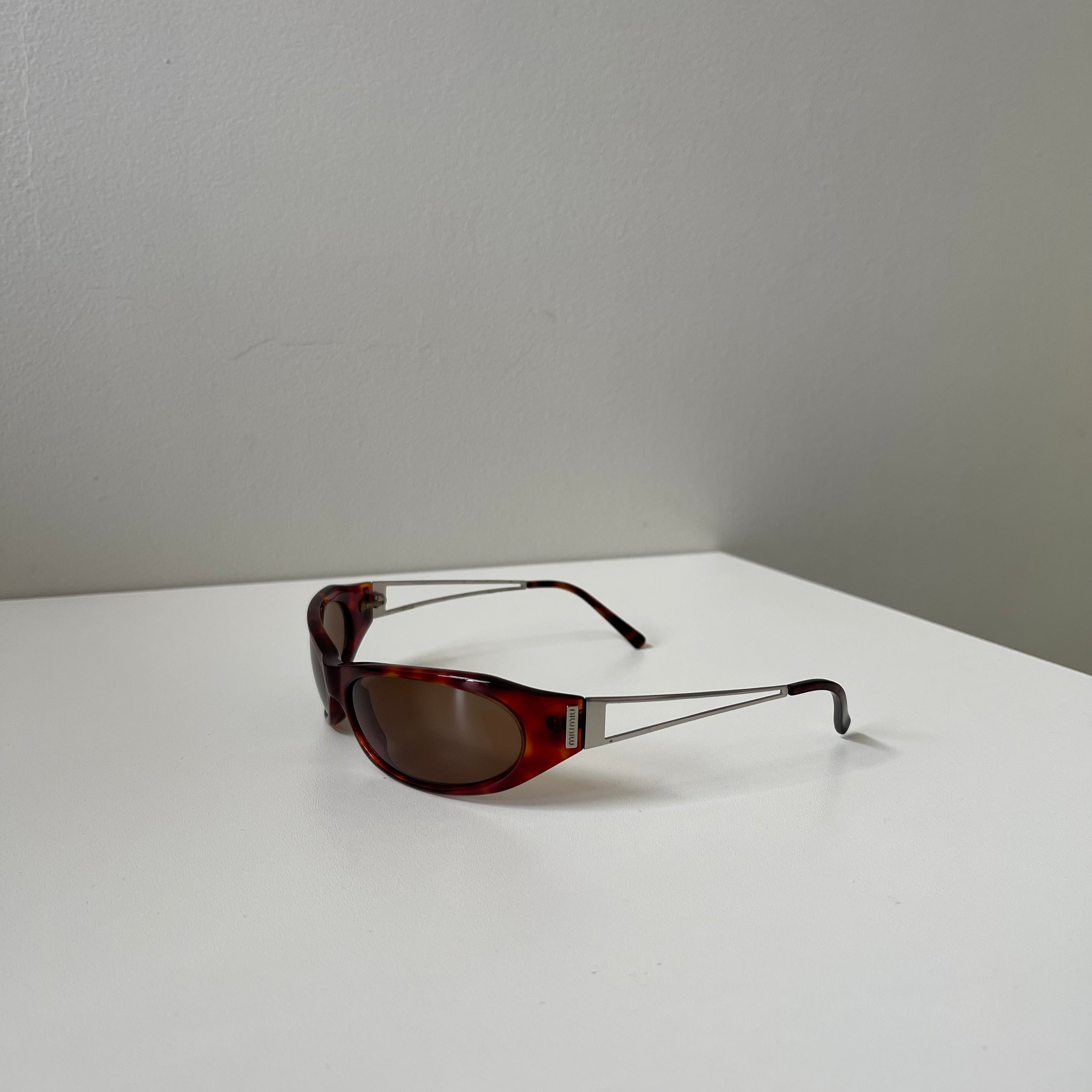 Miu miu SMU 01C Brown Sunglasses
