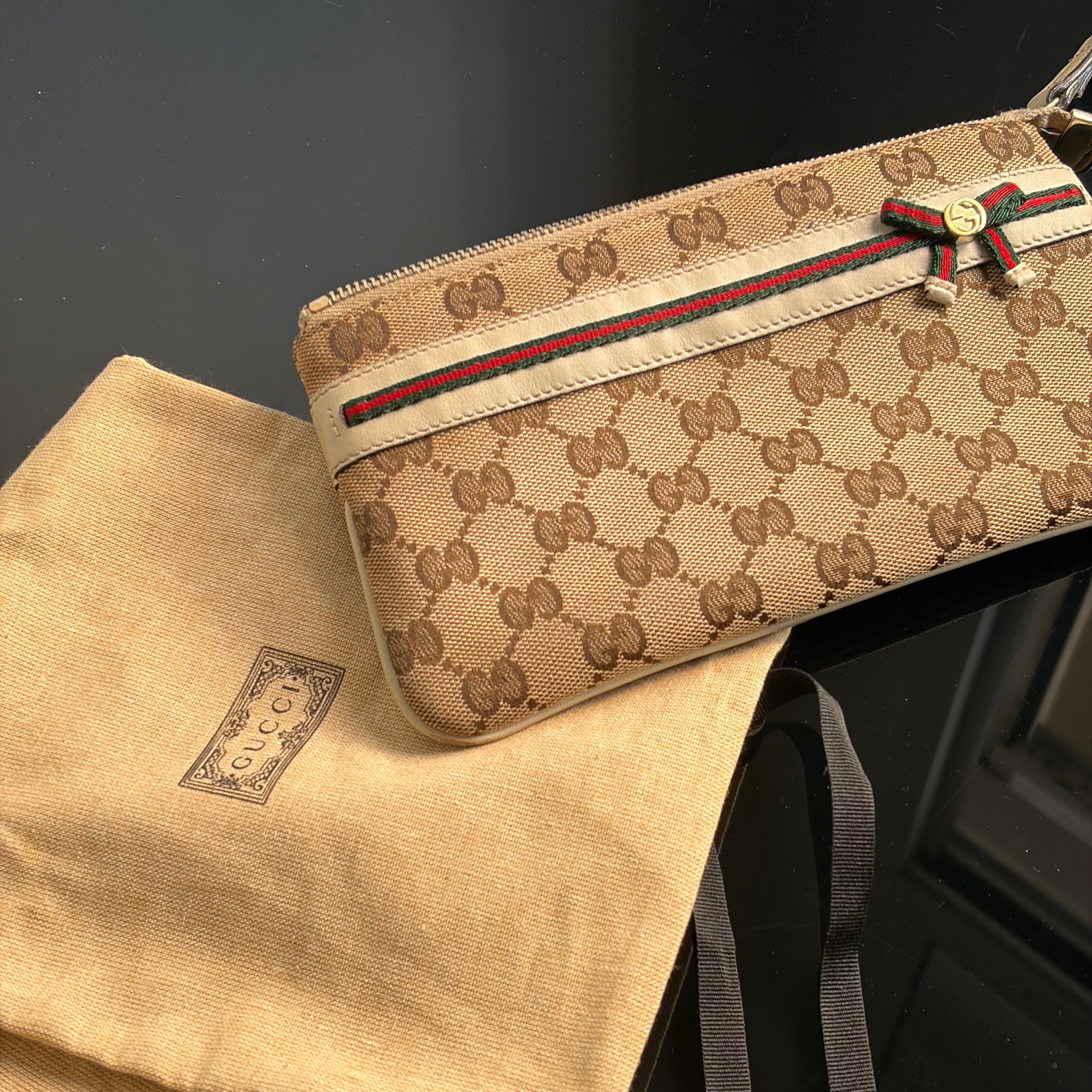 Gucci Monogram Mayfair Wristlet Bag