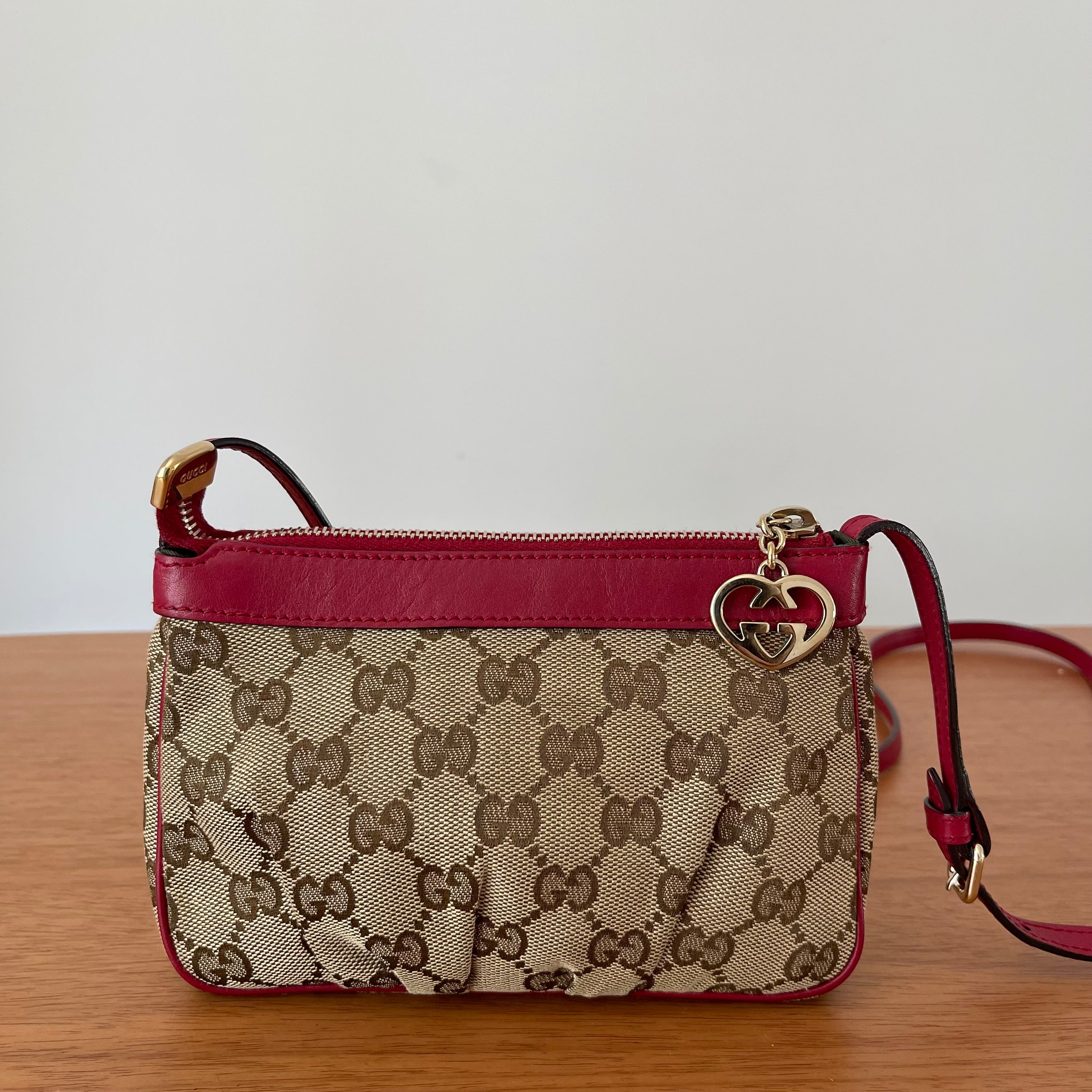 Gucci GG Monogram Supreme Crossbody Bag