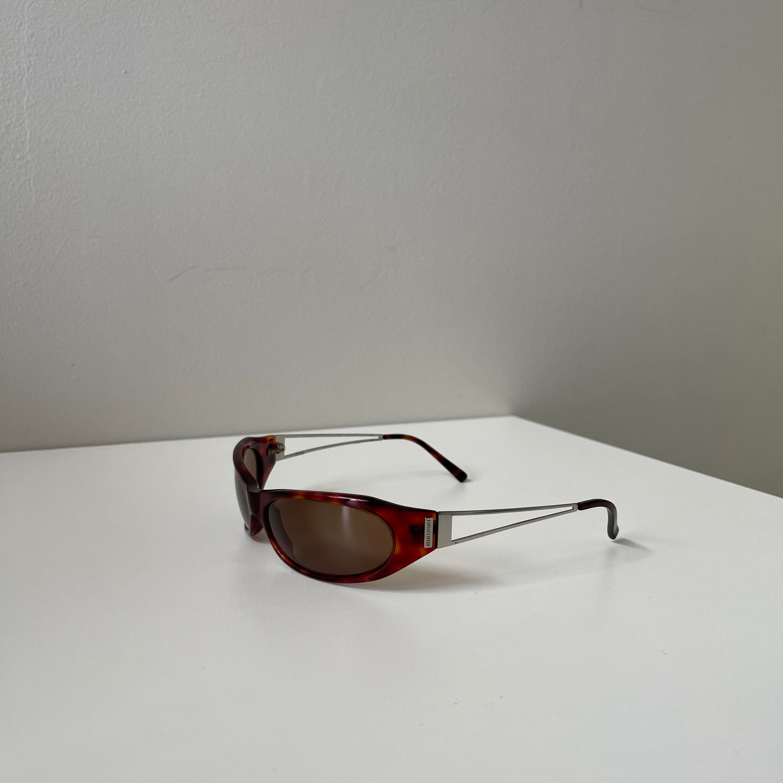 Miu miu SMU 01C Brown Sunglasses