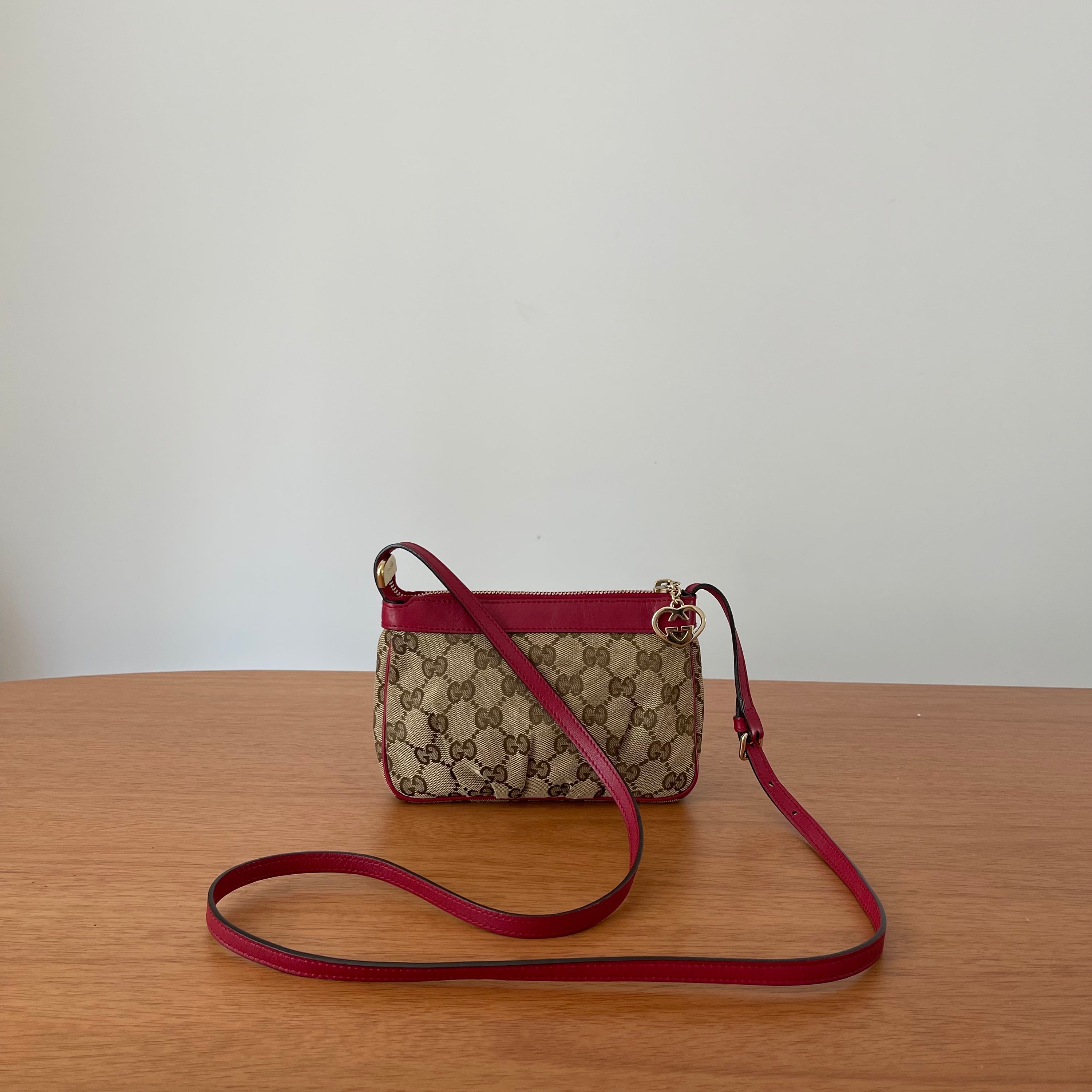 Gucci GG Monogram Supreme Crossbody Bag