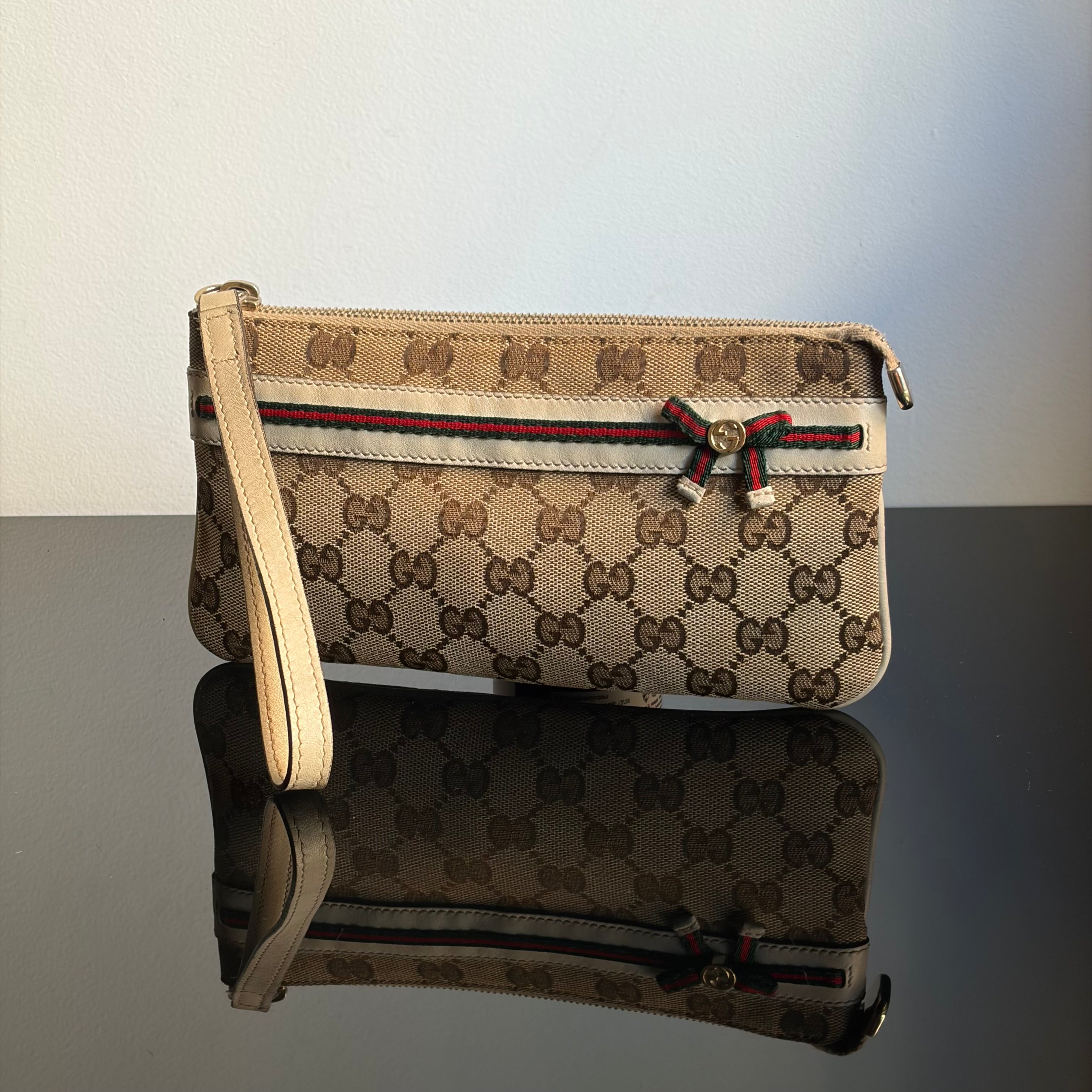 Gucci Monogram Mayfair Wristlet Bag
