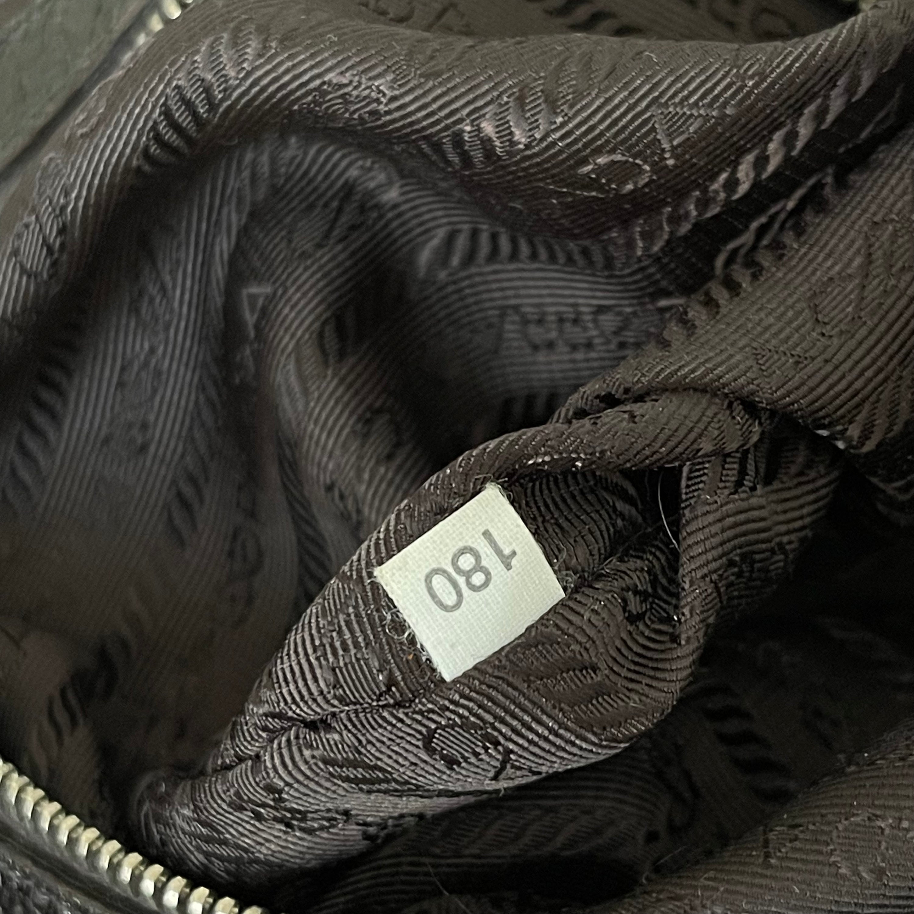 Prada Shimmering Leather Top Handle Bag