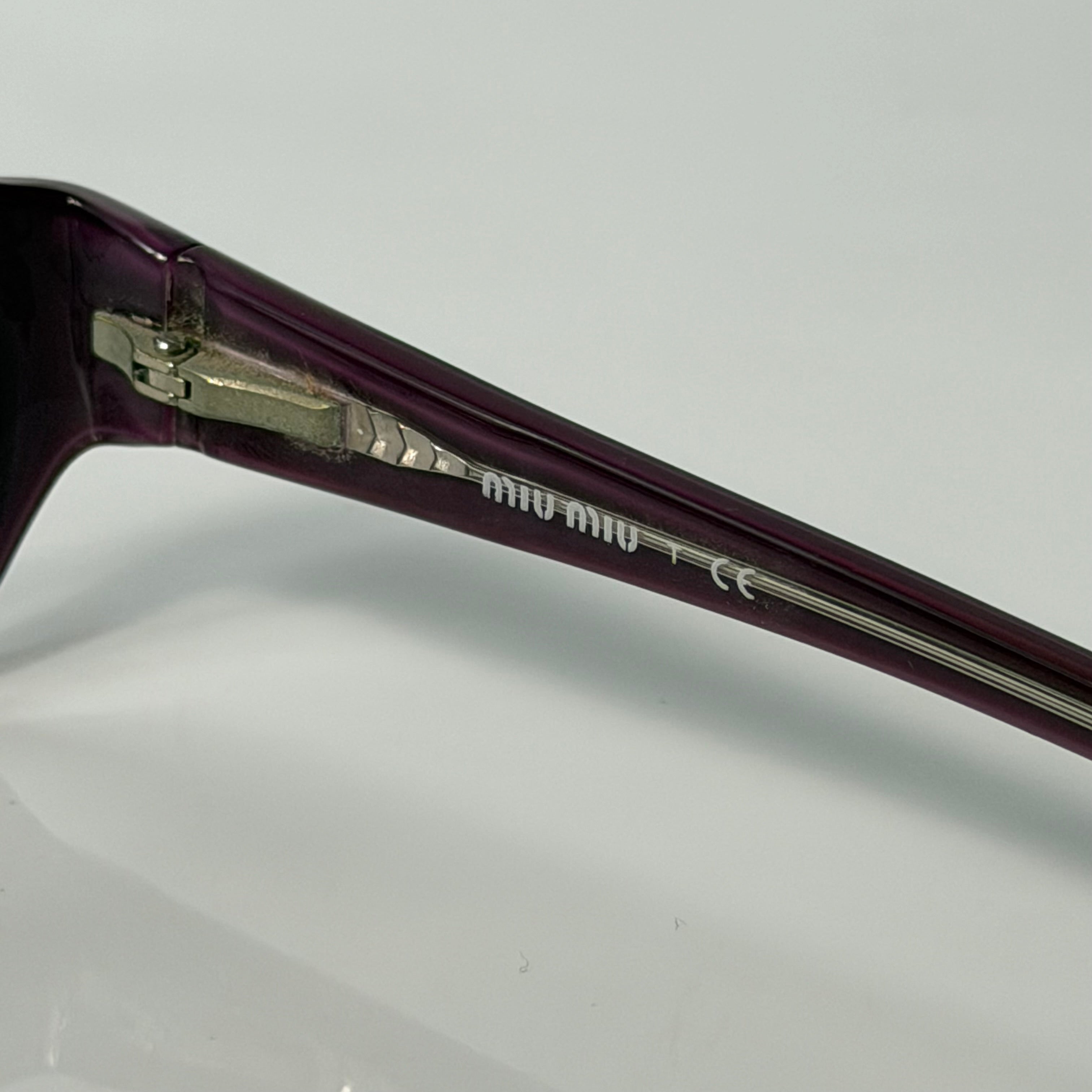 Miu Miu Purple Glasses