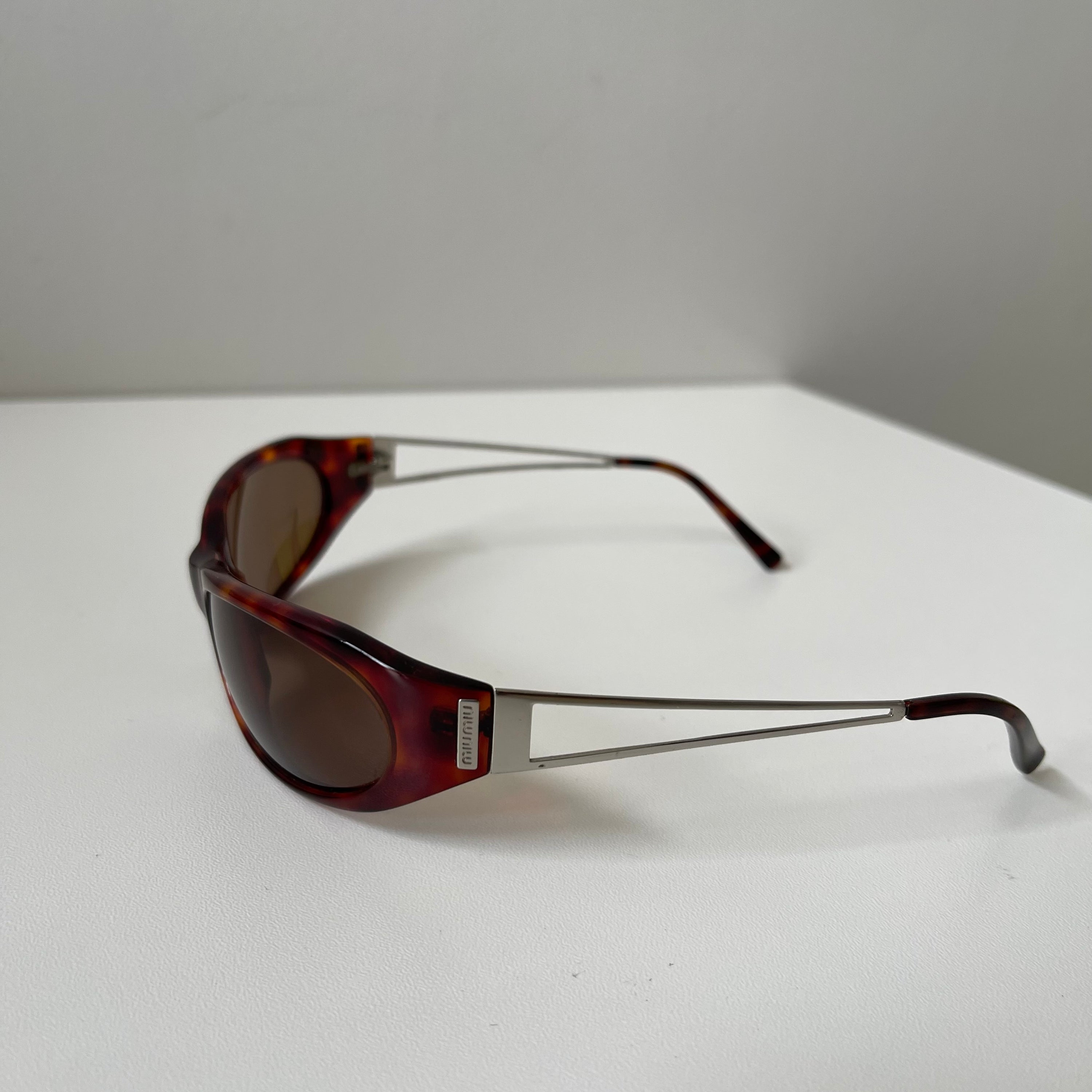 Miu miu SMU 01C Brown Sunglasses