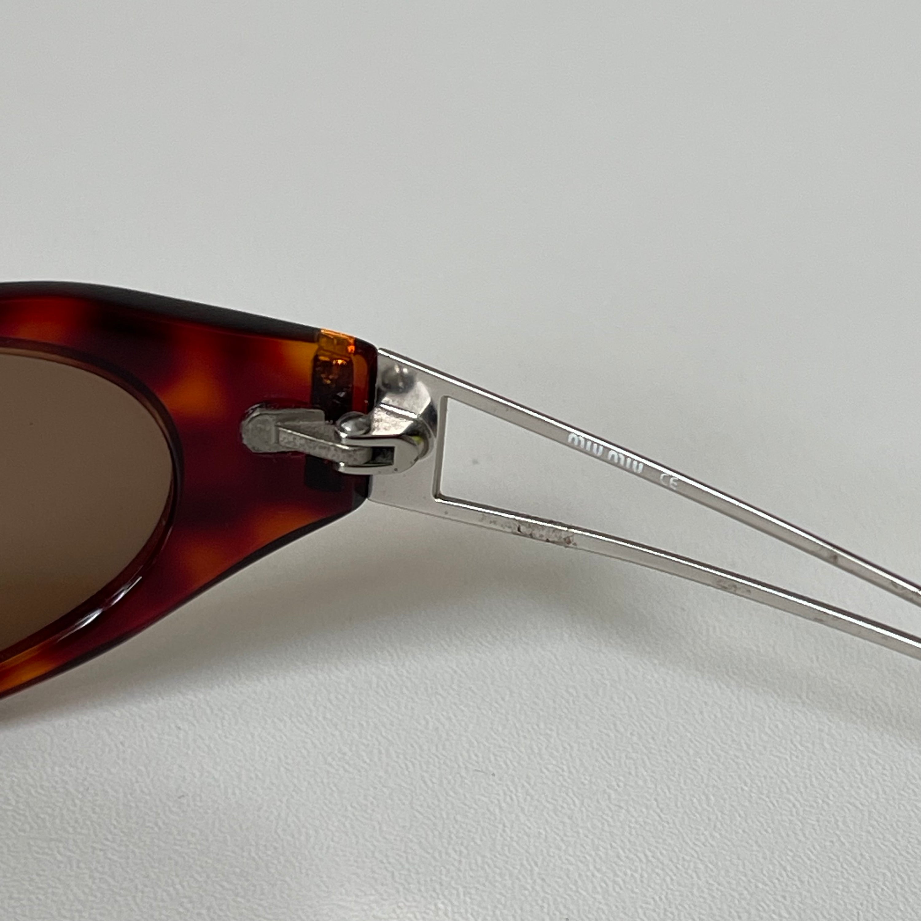 Miu miu SMU 01C Brown Sunglasses