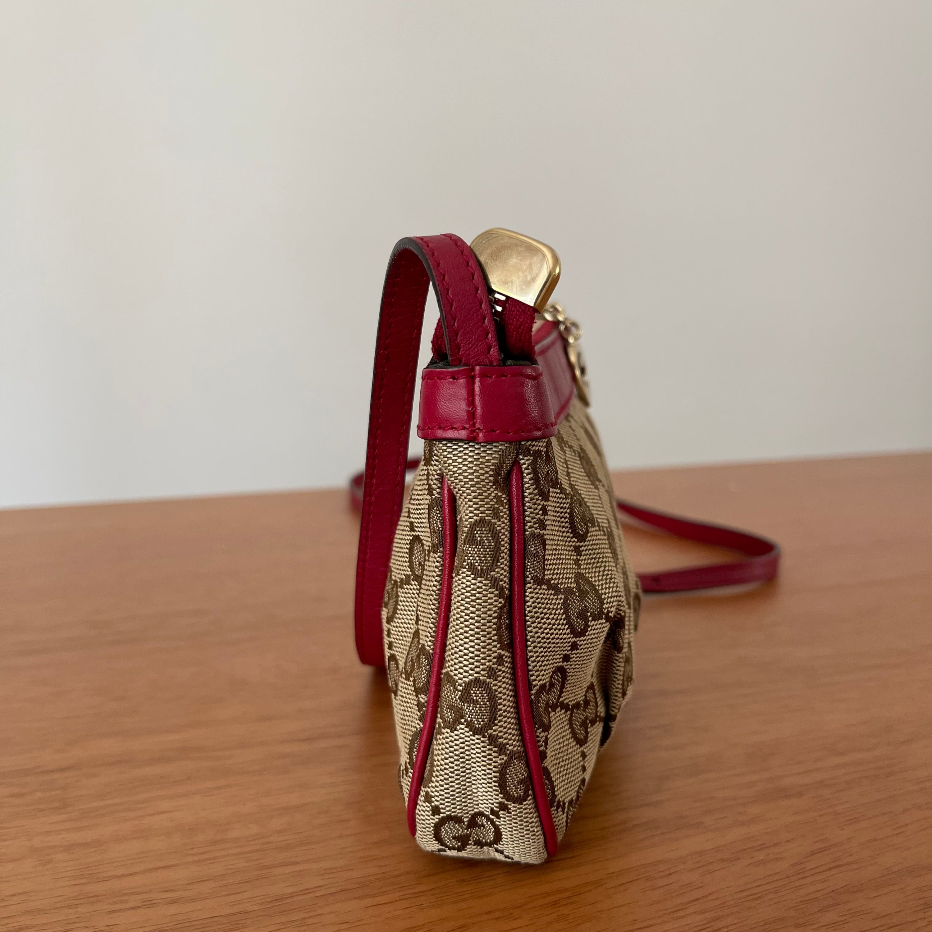 Gucci GG Monogram Supreme Crossbody Bag