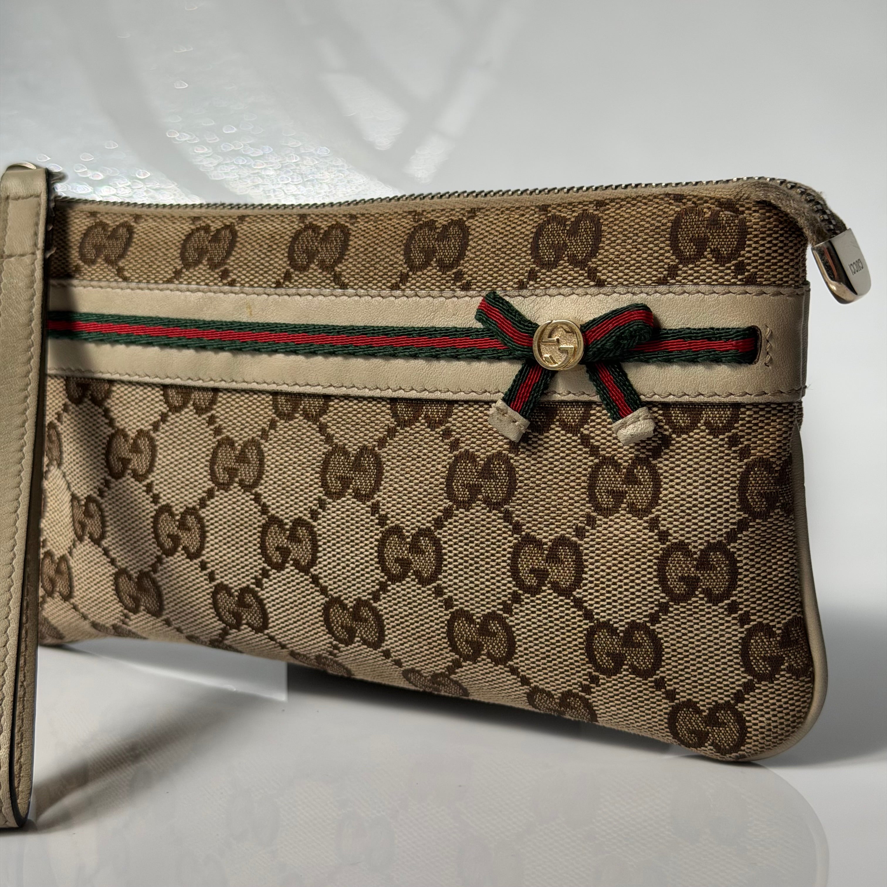 Gucci Monogram Mayfair Wristlet Bag