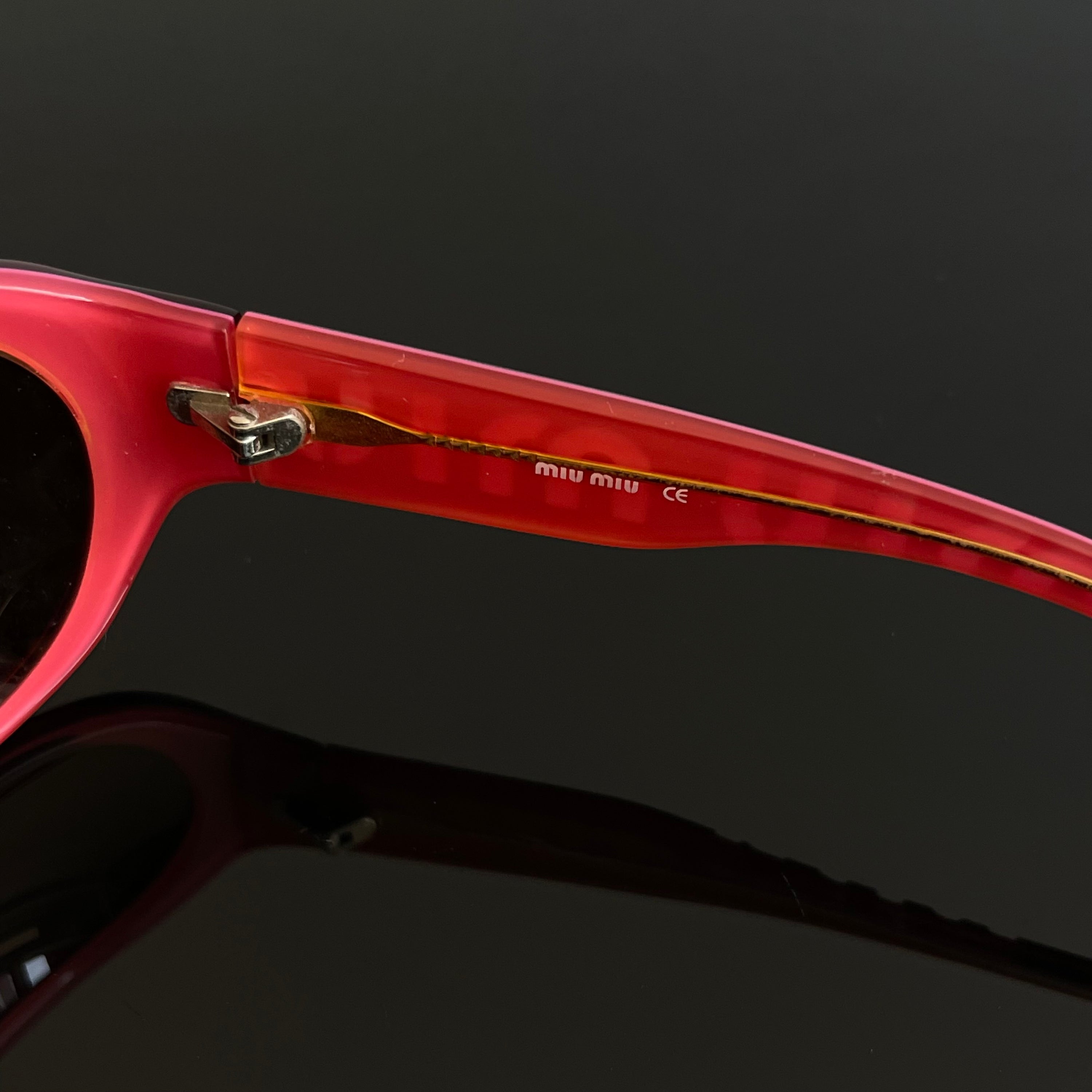 Miu Miu SMU06F Red Sunglasses