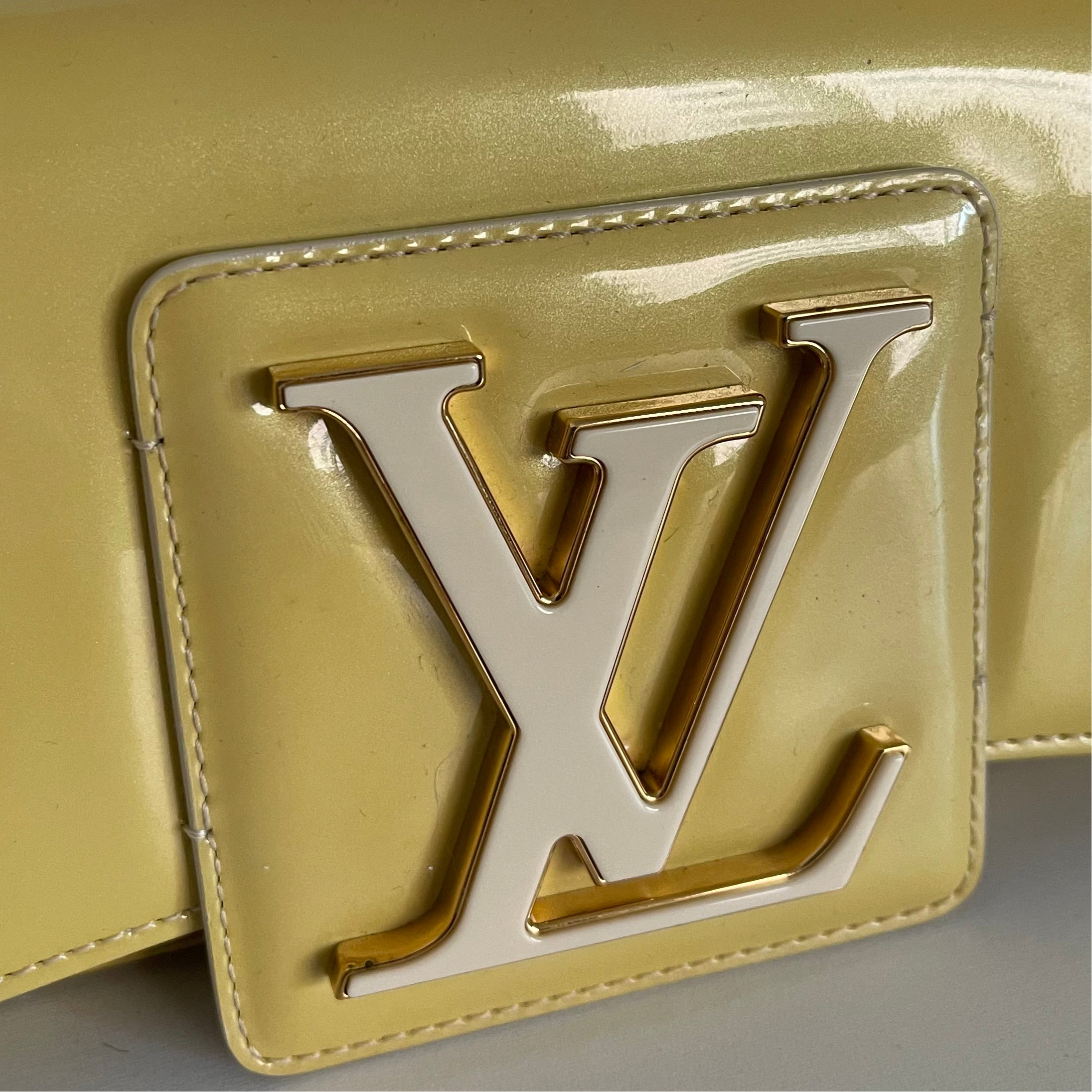 Louis Vuitton Sobe Clutch