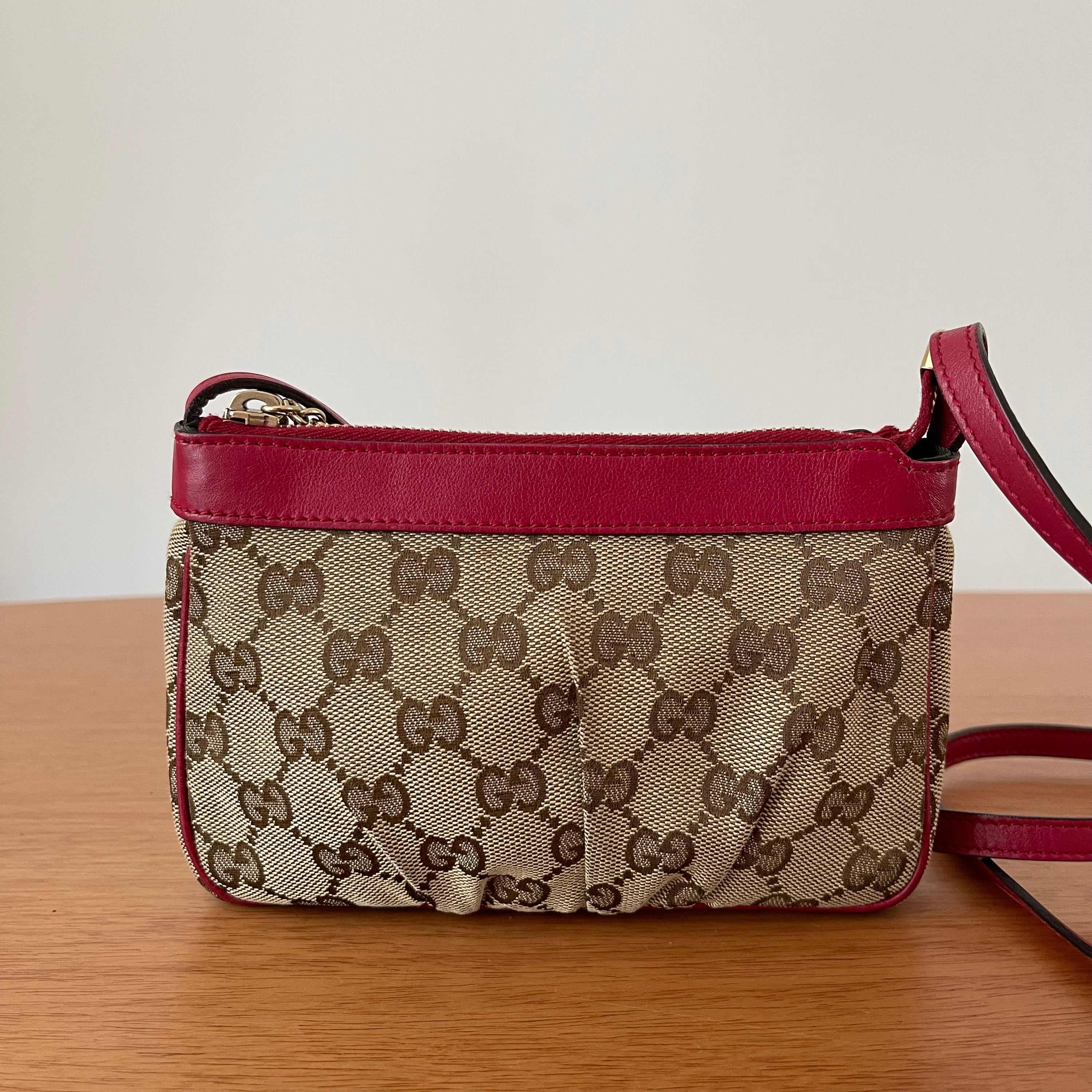 Gucci GG Monogram Supreme Crossbody Bag