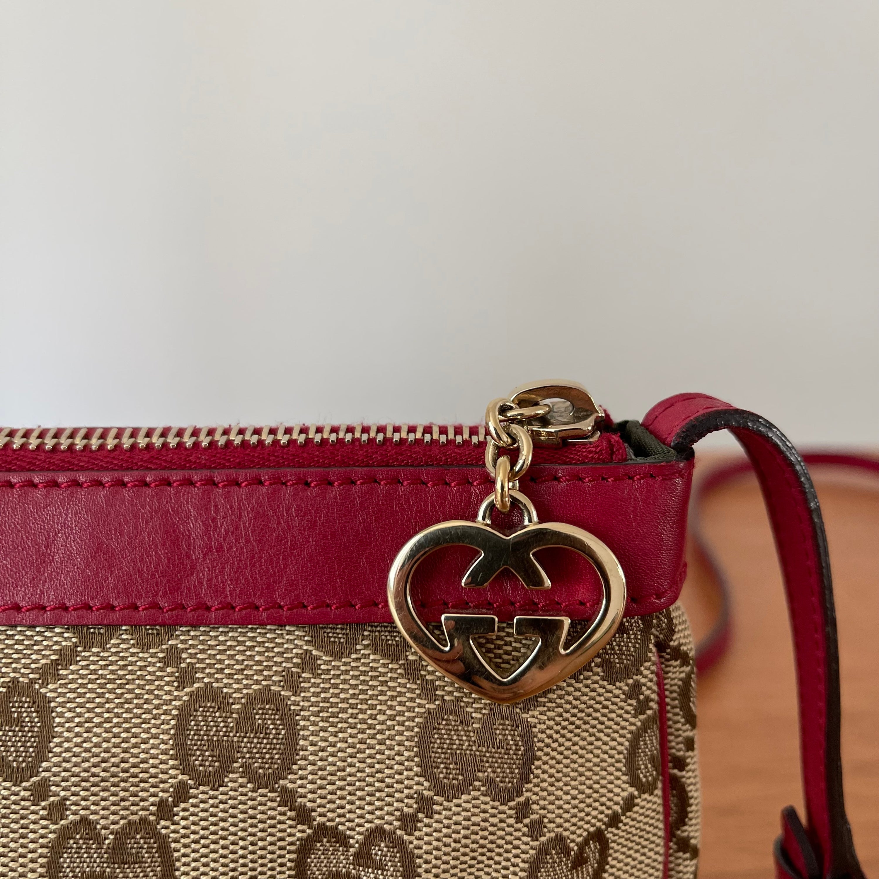 Gucci GG Monogram Supreme Crossbody Bag