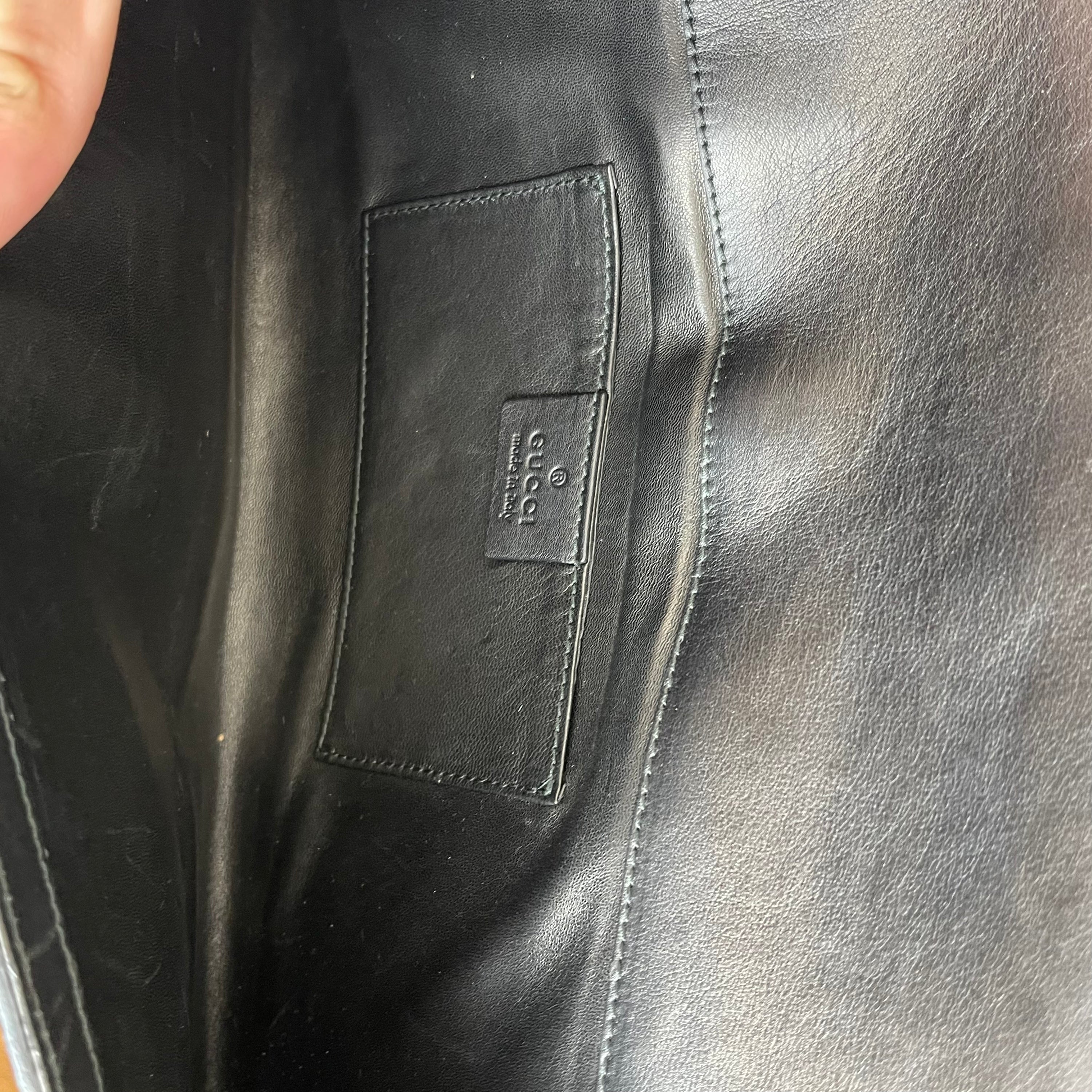Gucci GG Logo Clutch